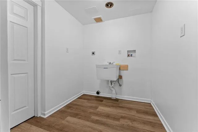 a view of small space with wooden floor