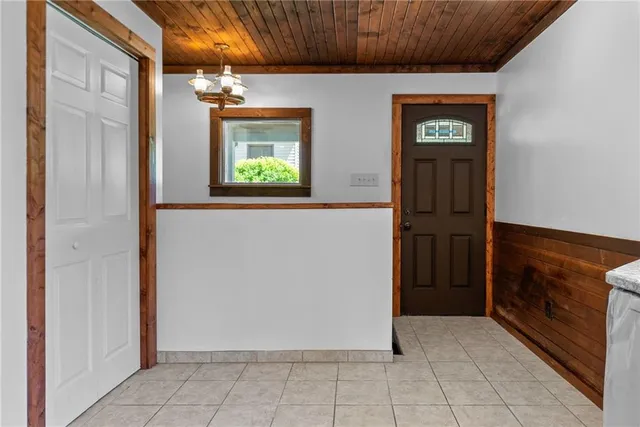 a view of an entryway and a livingroom