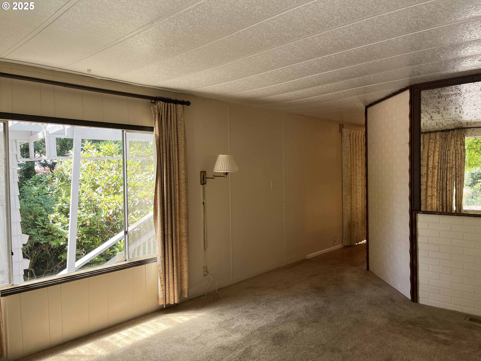 1600 Rhododendron Drive, Unit 261 Florence, OR 97439 - Photo 11 of 42 an empty room with windows