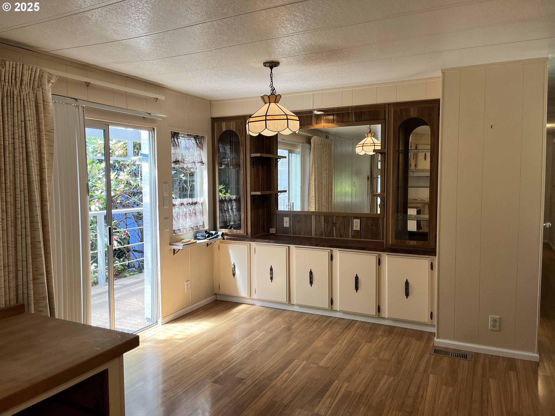 1600 Rhododendron Drive, Unit 261 Florence, OR 97439 - Photo 19 of 42 a view of a hallway with wooden floor and windows