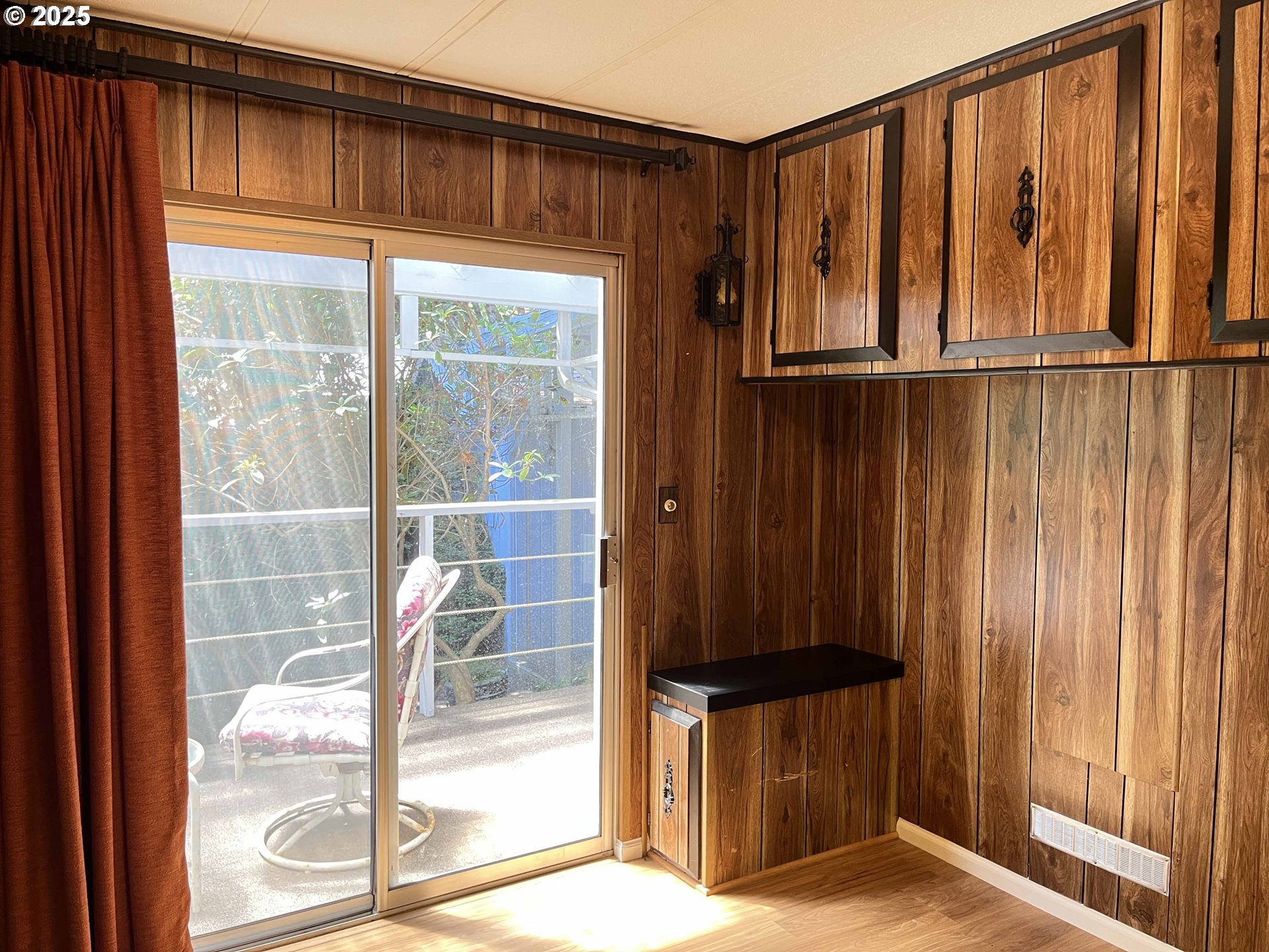 1600 Rhododendron Drive, Unit 261 Florence, OR 97439 - Photo 21 of 42 a view of a porch with wooden floor and a door