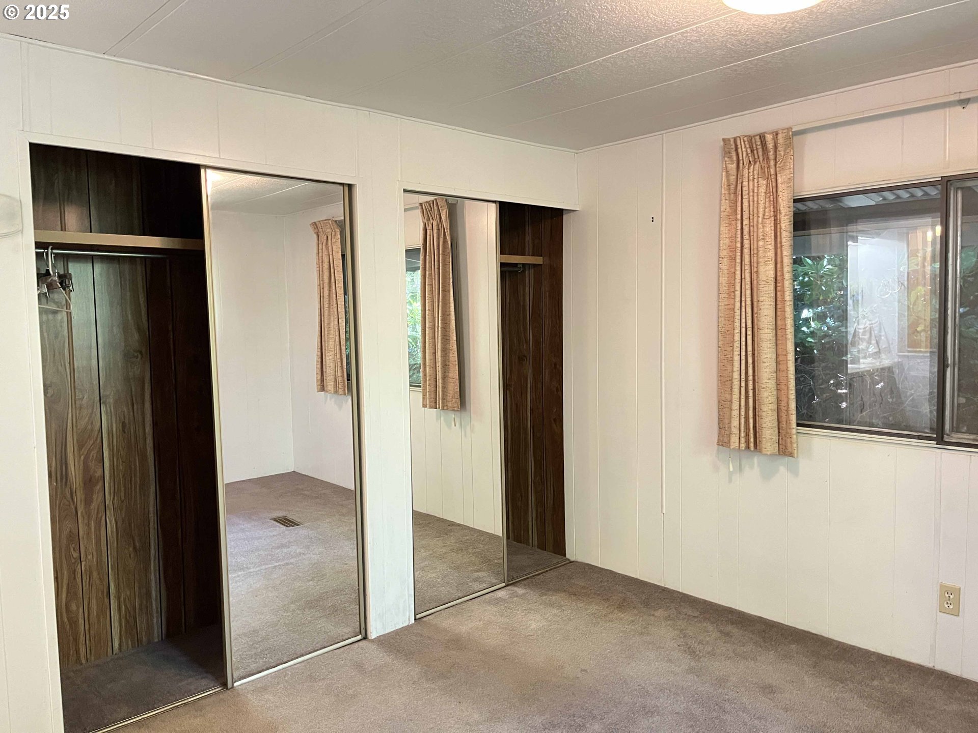 1600 Rhododendron Drive, Unit 261 Florence, OR 97439 - Photo 25 of 42 an empty room with closet