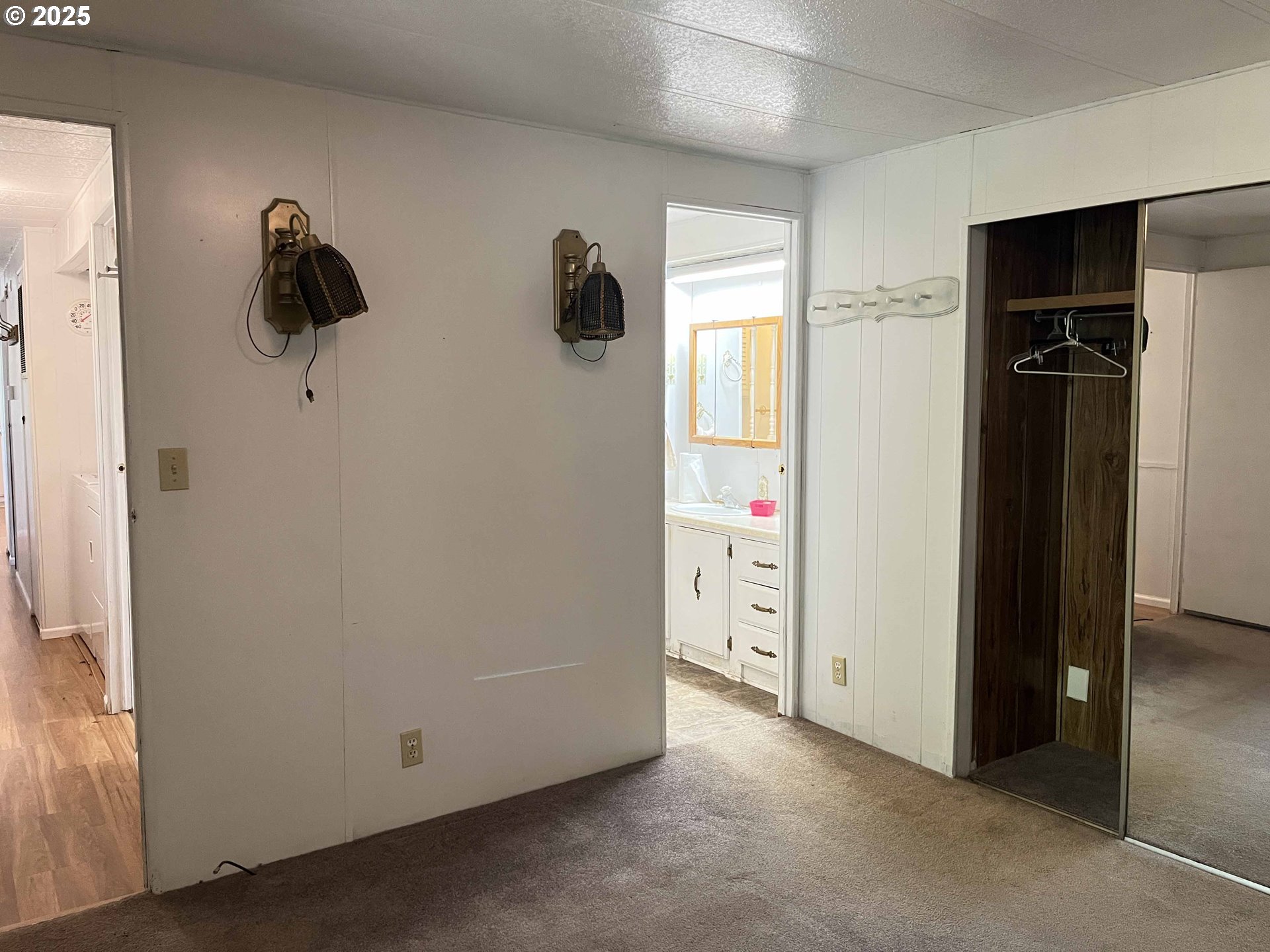 1600 Rhododendron Drive, Unit 261 Florence, OR 97439 - Photo 26 of 42 an empty room with windows and closet