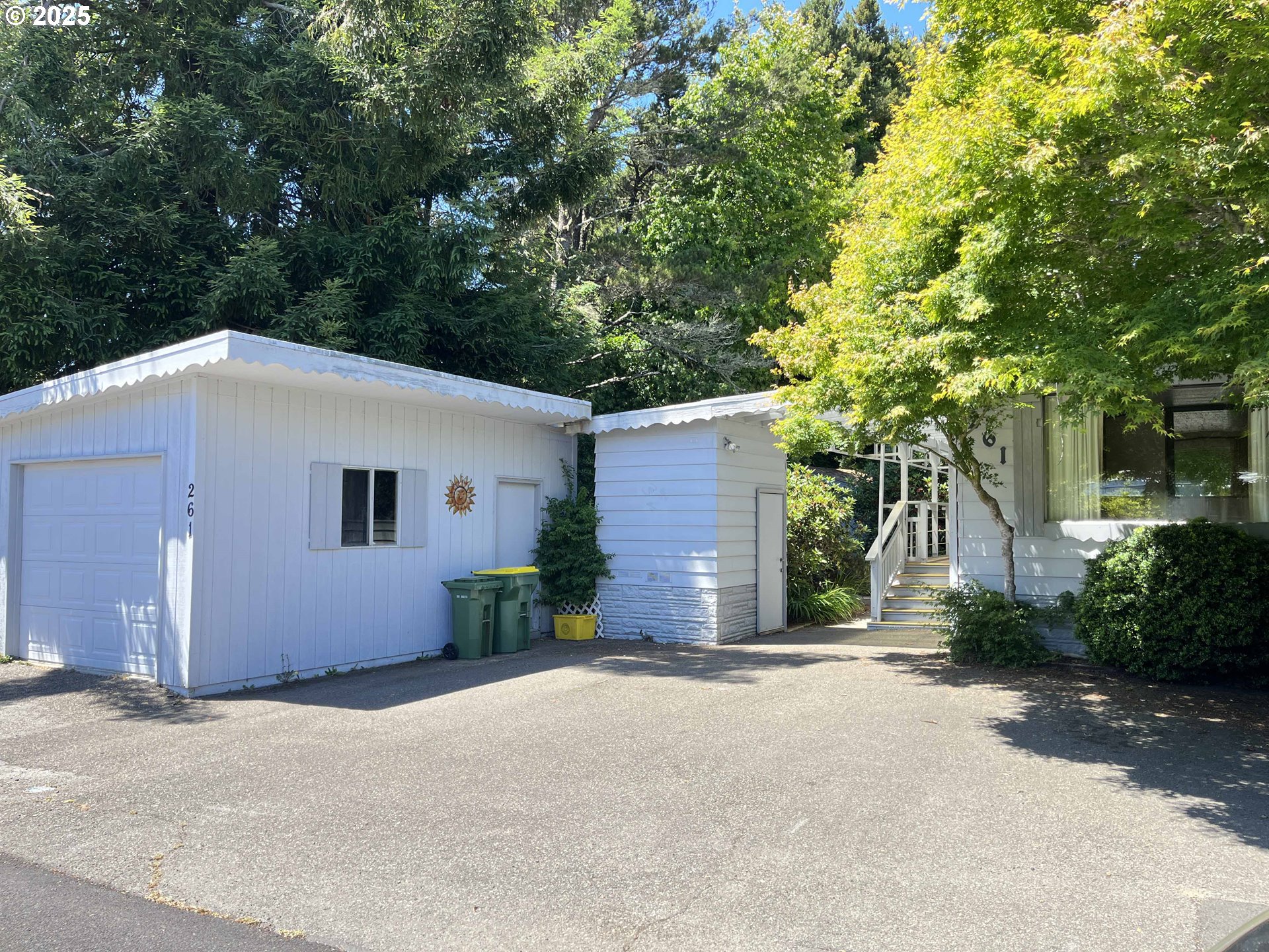 1600 Rhododendron Drive, Unit 261 Florence, OR 97439 - Photo 3 of 42 a view of a house with a street