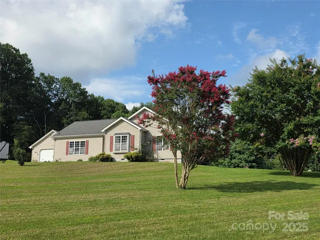 a house view with a garden space