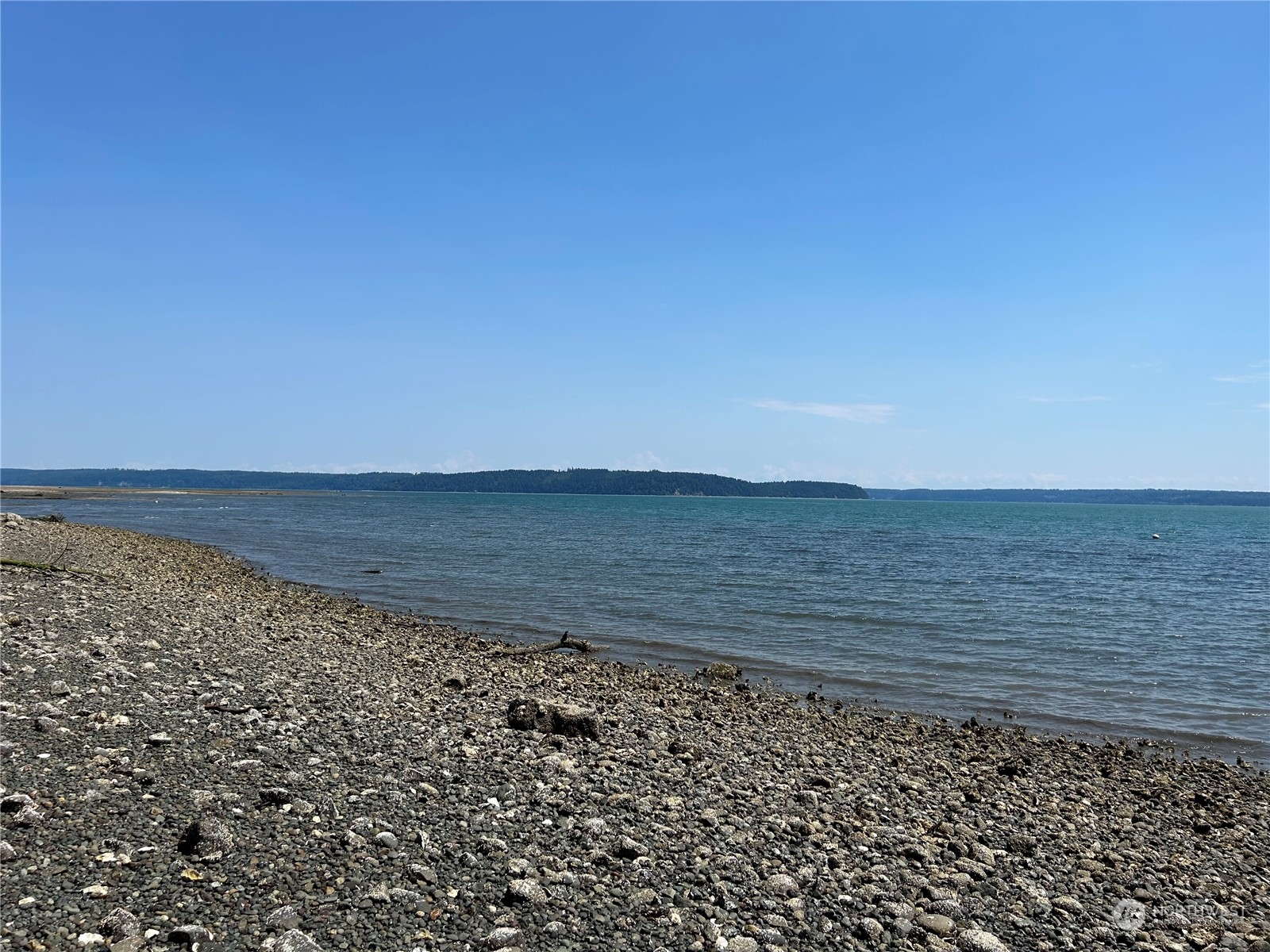 0 Highway 101 Brinnon, WA 98320 - Photo 17 of 19 a view of an ocean beach and mountain
