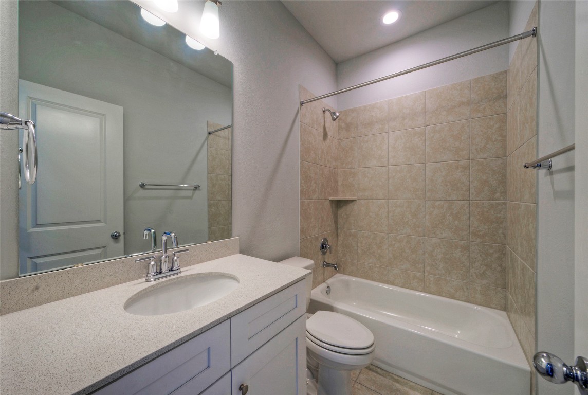 2312 Castillo Drive Round Rock, TX 78664 - Photo 20 of 21 a bathroom with a sink toilet and shower