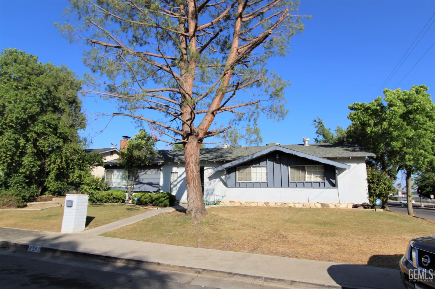 Undisclosed Address Bakersfield, CA 93306 - Photo 2 of 18 a view of a house with a yard