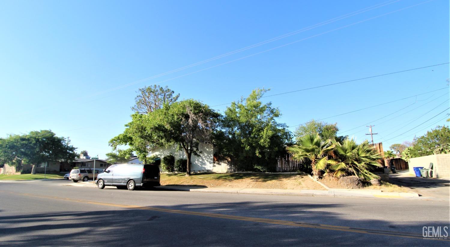 Undisclosed Address Bakersfield, CA 93306 - Photo 3 of 18 a view of street with houses