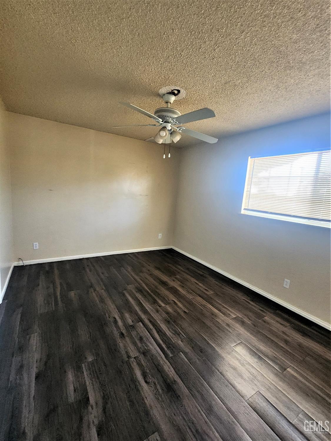 Undisclosed Address Bakersfield, CA 93306 - Photo 10 of 18 wooden floor in an empty room