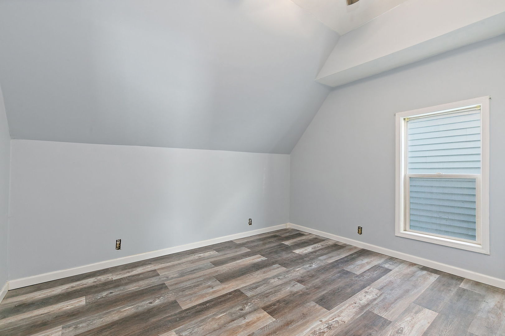 329 South 10th Street DeKalb, IL 60115 - Photo 16 of 25 a view of a room that has a window