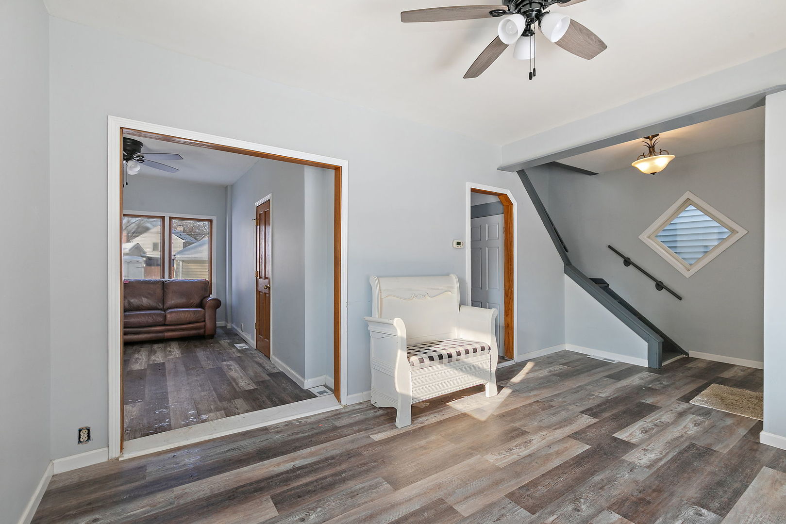 329 South 10th Street DeKalb, IL 60115 - Photo 6 of 25 a view of a hallway view with staircase
