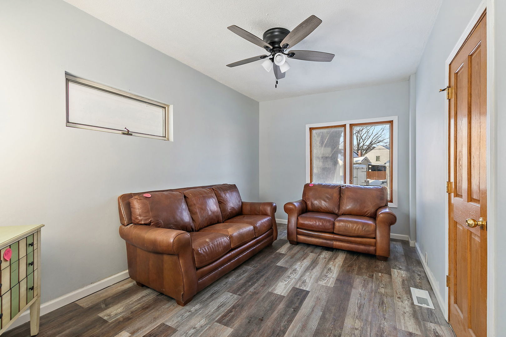 329 South 10th Street DeKalb, IL 60115 - Photo 7 of 25 a living room with furniture and a window