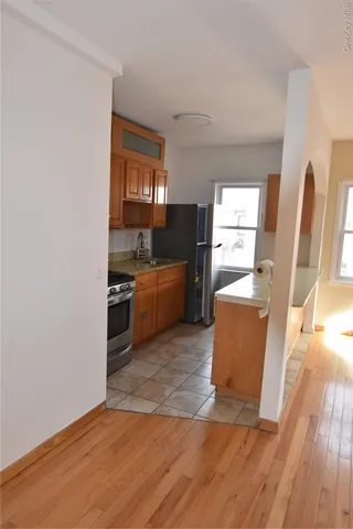 a room with furniture and a wooden floor