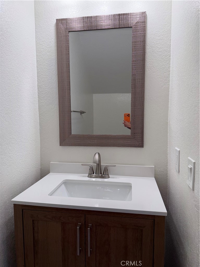 208 Santa Rosa Court, Unit 208 Laguna Beach, CA 92651 - Photo 9 of 18 downstairs powder room
