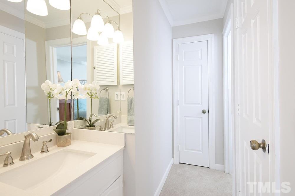 5903 Sentinel Drive Raleigh, NC 27609 - Photo 14 of 26 Master Bathroom with interior linen closet and access to Master walk-in closet.
