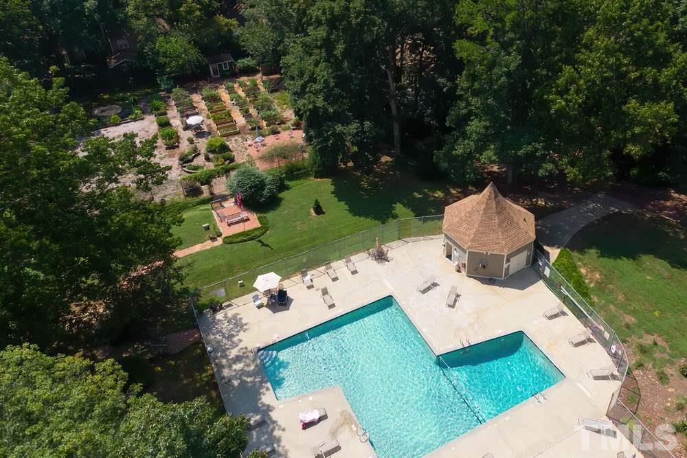 5903 Sentinel Drive Raleigh, NC 27609 - Photo 23 of 26 View of the pool and community garden area for Whitehall.