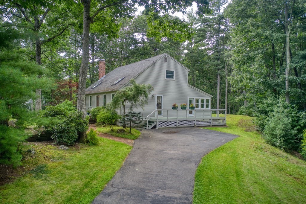 40 Tenney Road Rowley, MA 01969 - Photo 26 of 28 a view of house with garden and trees