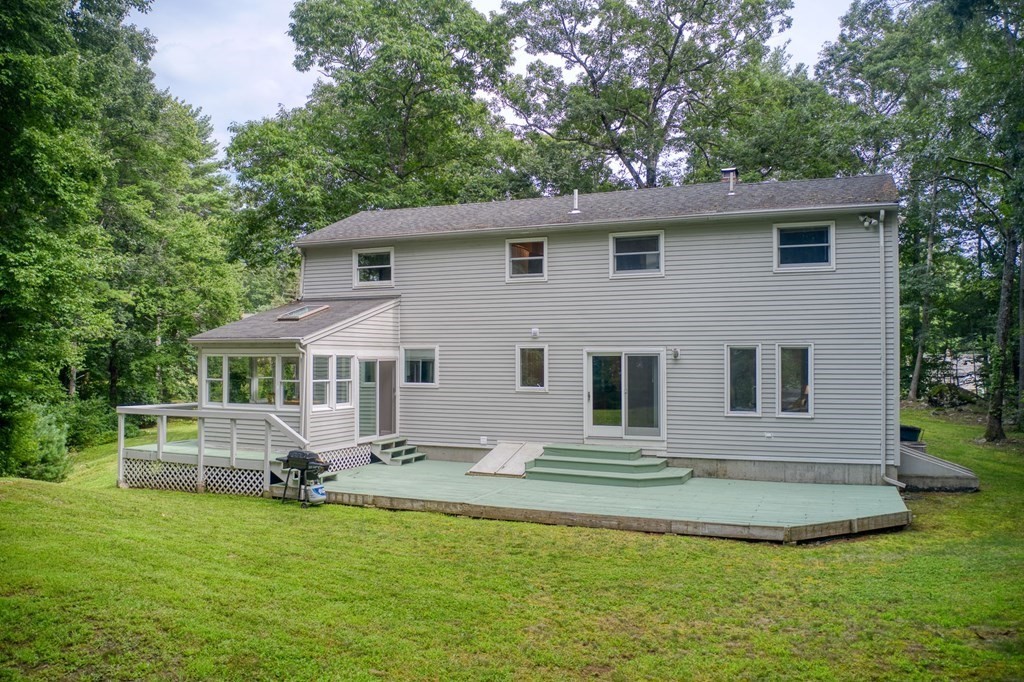 40 Tenney Road Rowley, MA 01969 - Photo 28 of 28 a front view of a house with a yard
