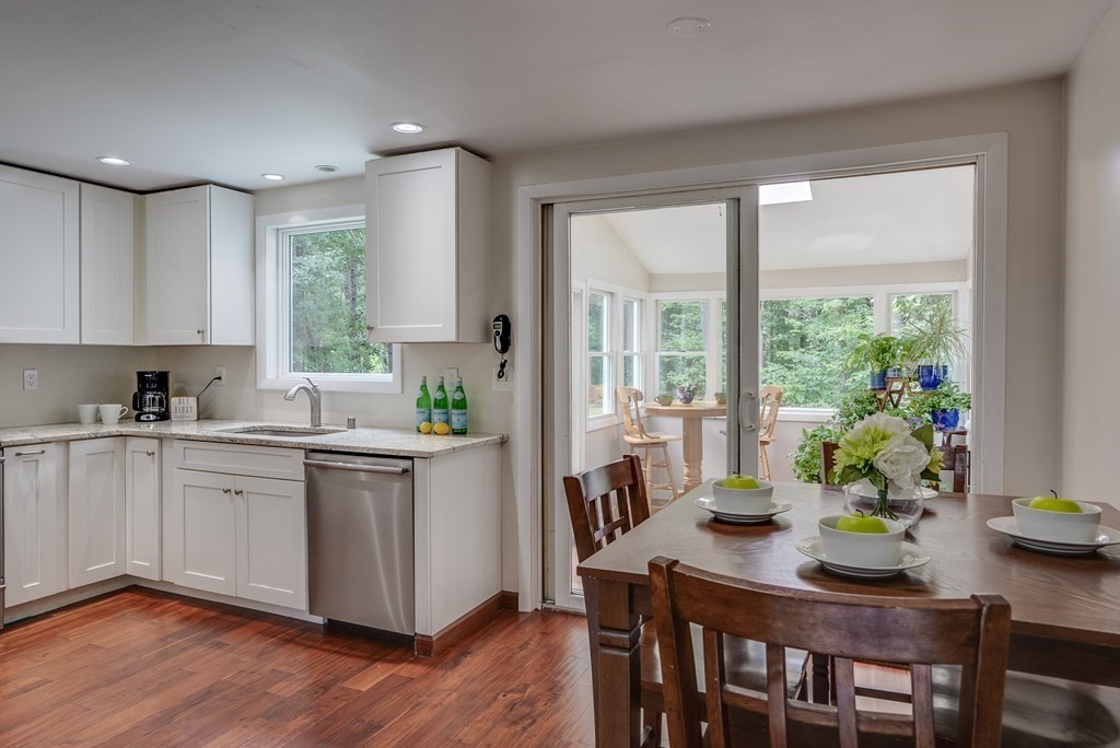 40 Tenney Road Rowley, MA 01969 - Photo 8 of 28 a kitchen with a table and chairs in it