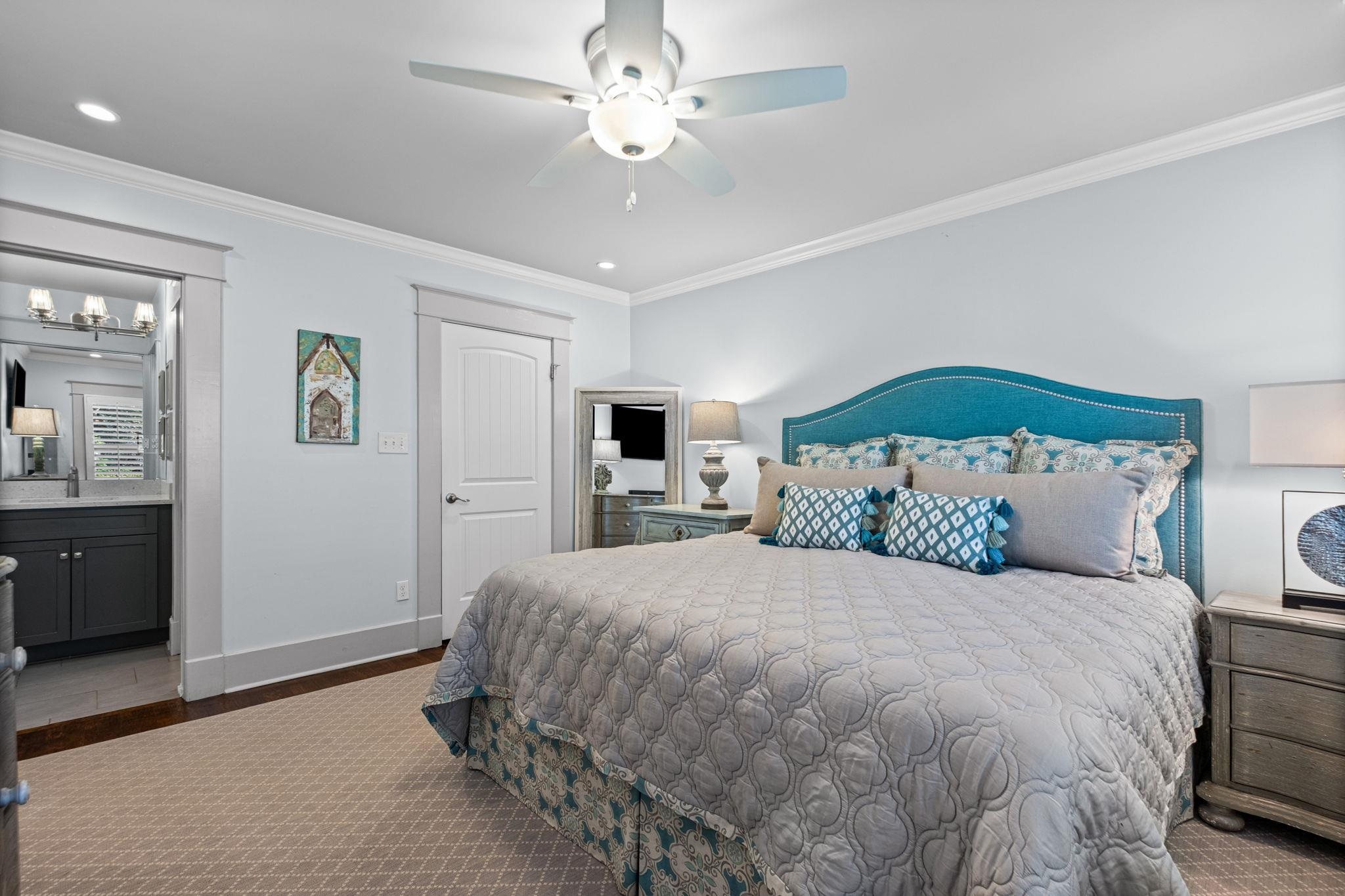5079 Walnut Grove Road Memphis, TN 38117 - Photo 21 of 40 Recessed lighting, ceiling fan, crown molding, wood-finish flooring, and a vanity with a rectangular sink