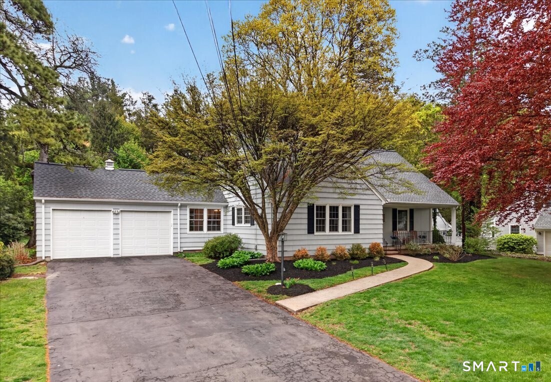 54 Jackson Road Hamden, CT 06517 - Photo 1 of 40 front view of house with a yard