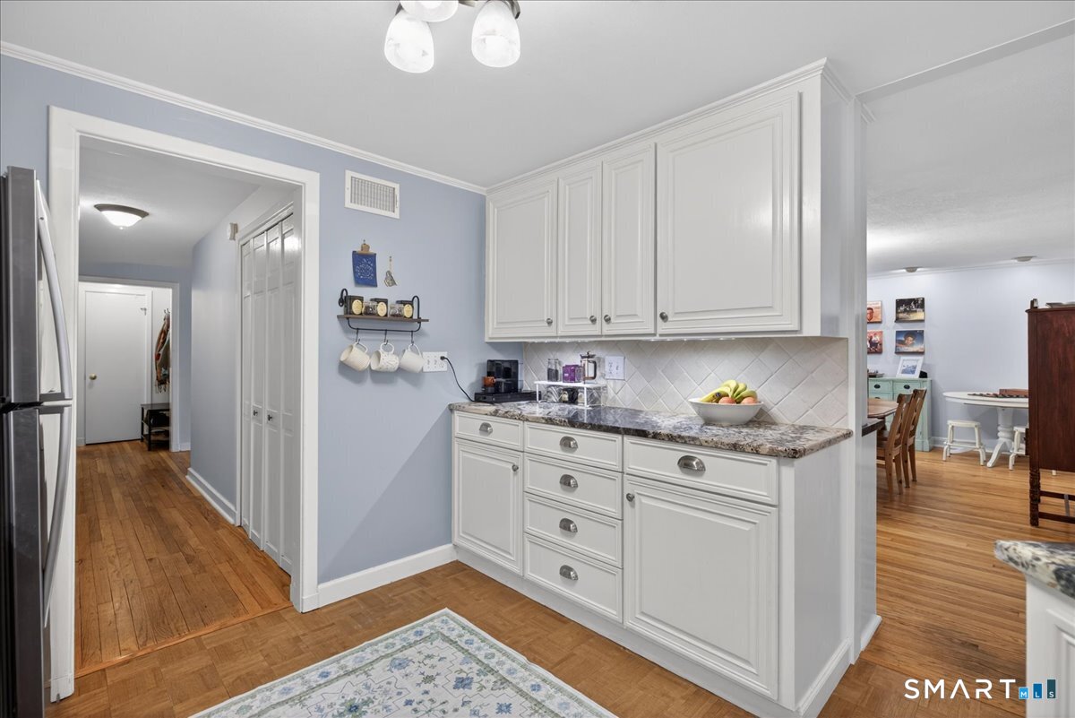 54 Jackson Road Hamden, CT 06517 - Photo 13 of 40 a kitchen with stainless steel appliances granite countertop a refrigerator and a stove