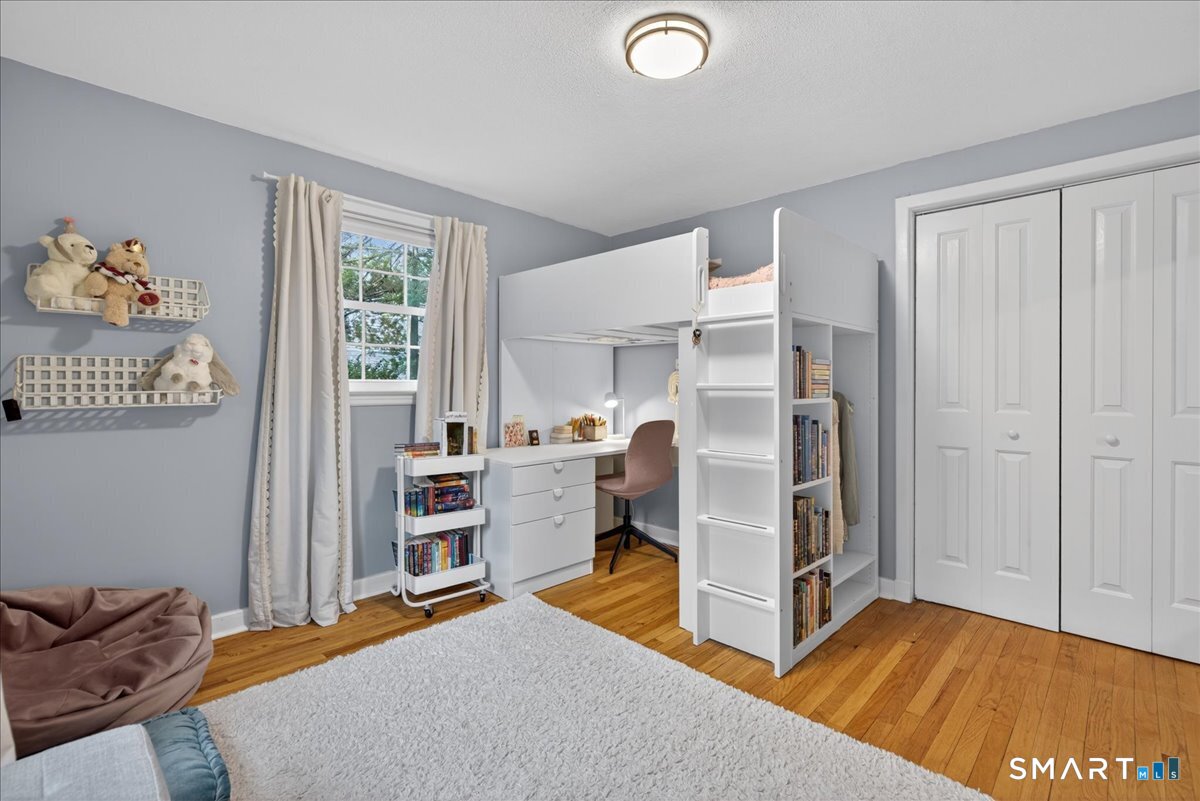 54 Jackson Road Hamden, CT 06517 - Photo 26 of 40 a room with furniture and a window