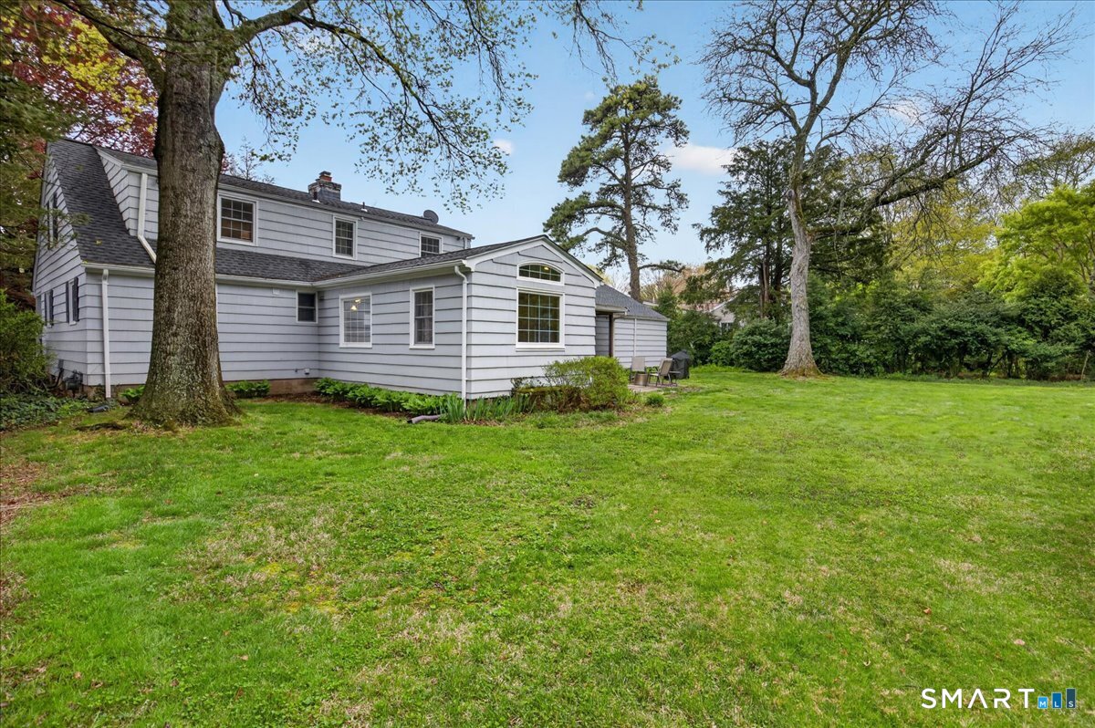 54 Jackson Road Hamden, CT 06517 - Photo 33 of 40 a front view of house with yard and green space