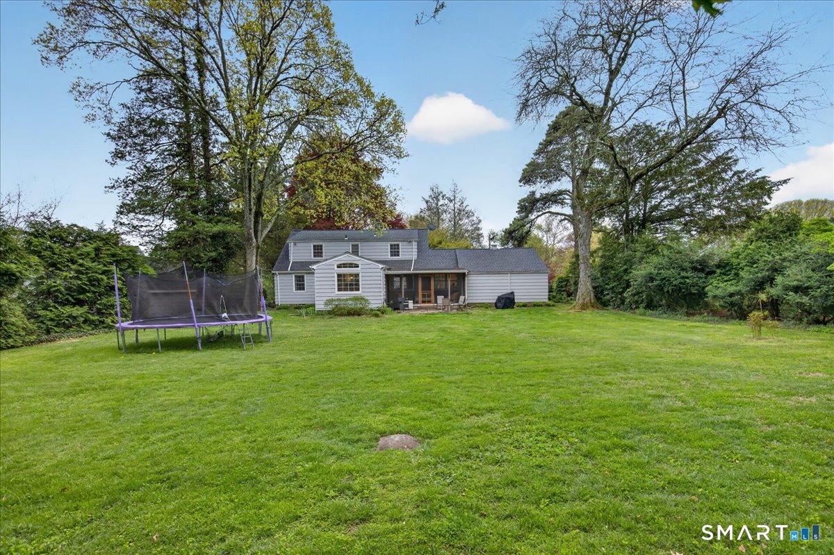 54 Jackson Road Hamden, CT 06517 - Photo 34 of 40 a view of a house with a backyard