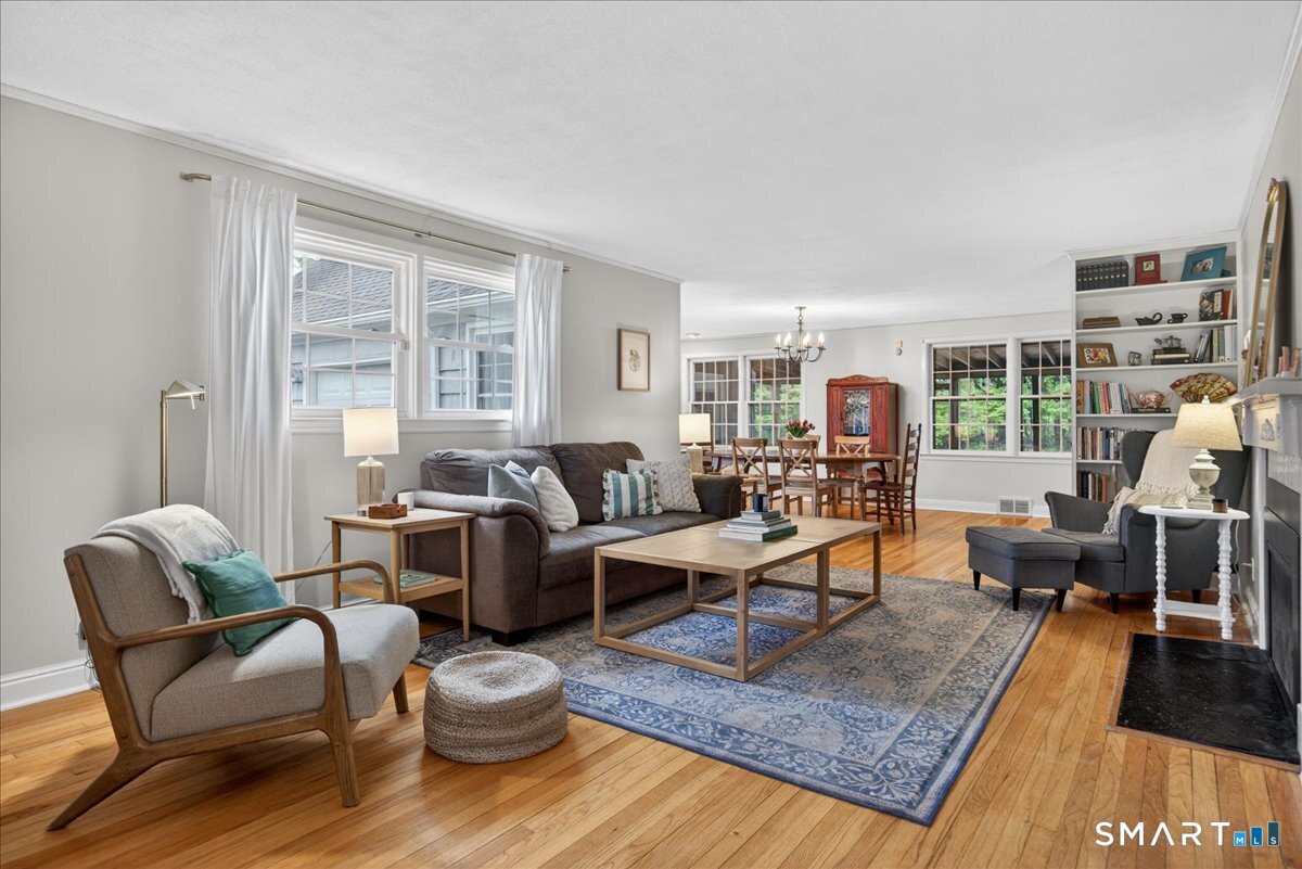 54 Jackson Road Hamden, CT 06517 - Photo 5 of 40 a living room with furniture and a wooden floor