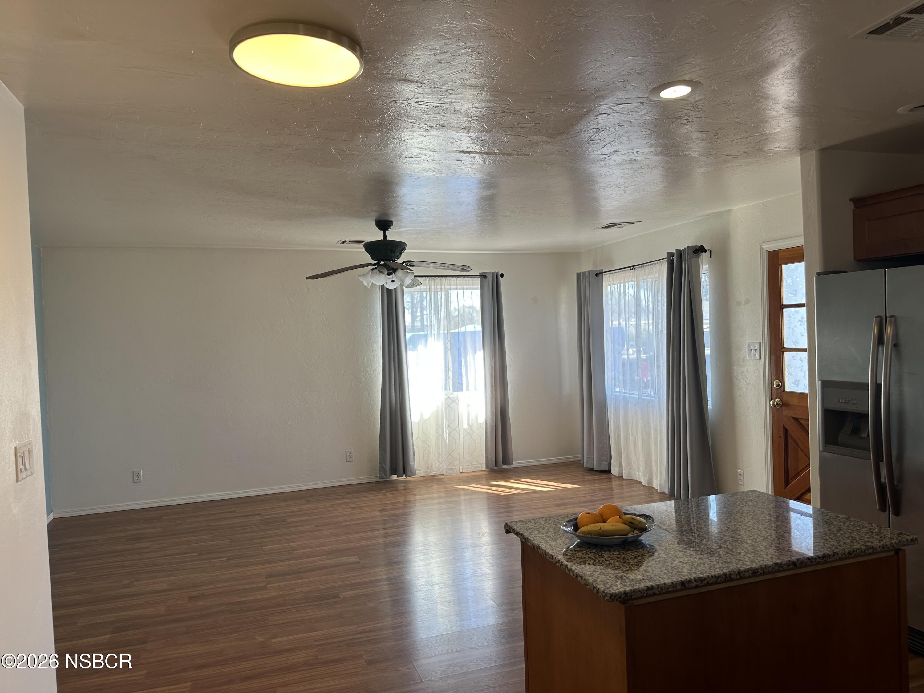 192 East Branch Street Nipomo, CA 93444 - Photo 11 of 26 a view of room with window and wooden floor