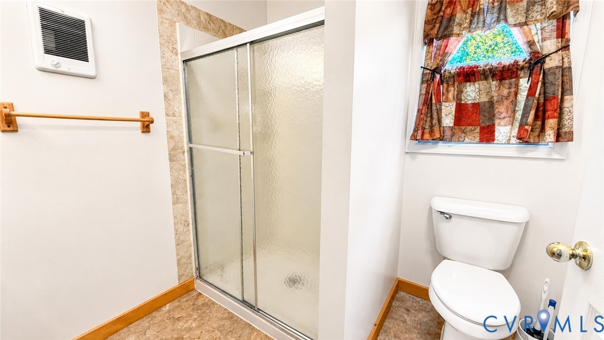5560 West Hoover Road Reva, VA 22735 - Photo 32 of 32 Shower enclosure with textured glass doors, tiled
