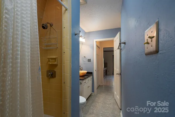 a view of a hallway with closet