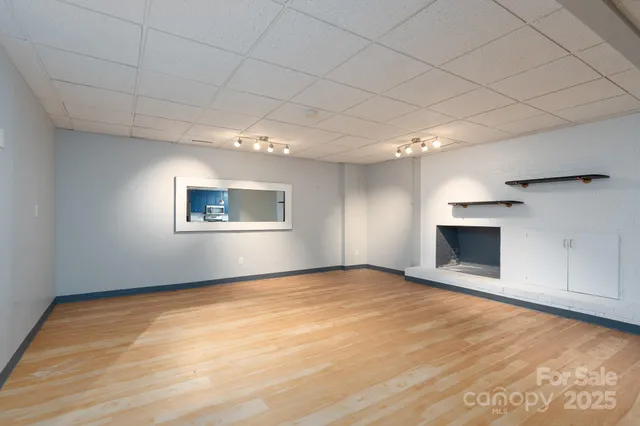 an empty room with windows