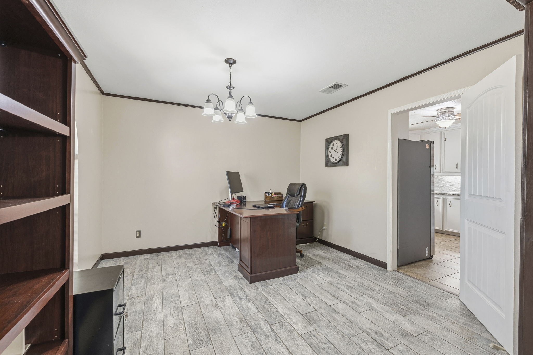 17603 Loring Lane Spring, TX 77388 - Photo 11 of 50 a living room with furniture and a flat screen tv