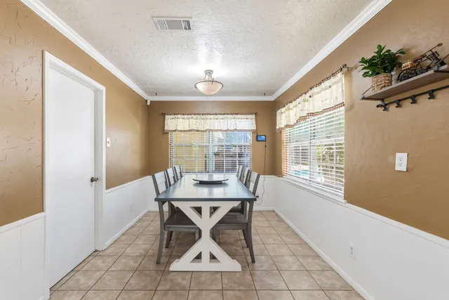 a workspace with furniture and window