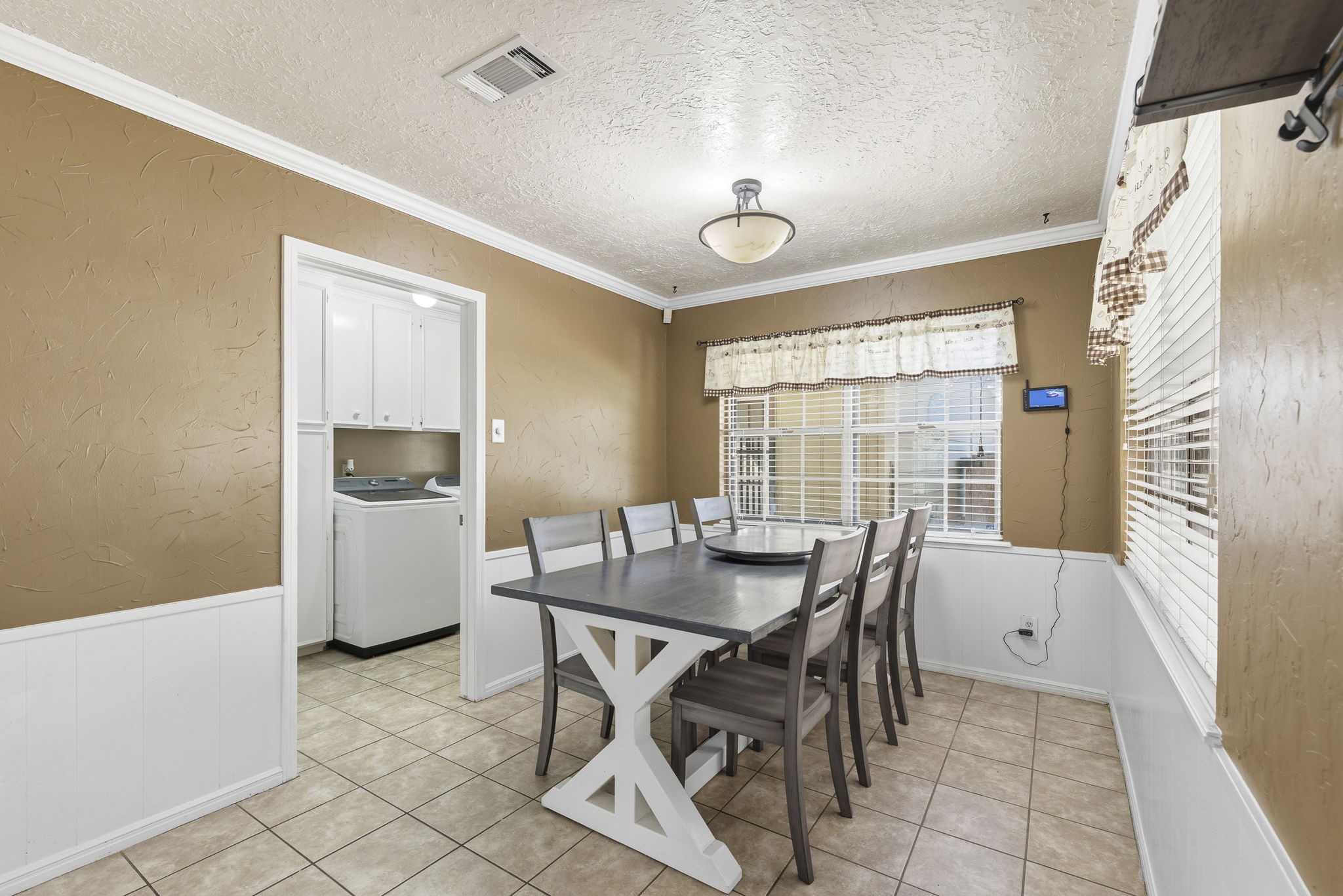 17603 Loring Lane Spring, TX 77388 - Photo 18 of 50 a view of a dining room with furniture and a window