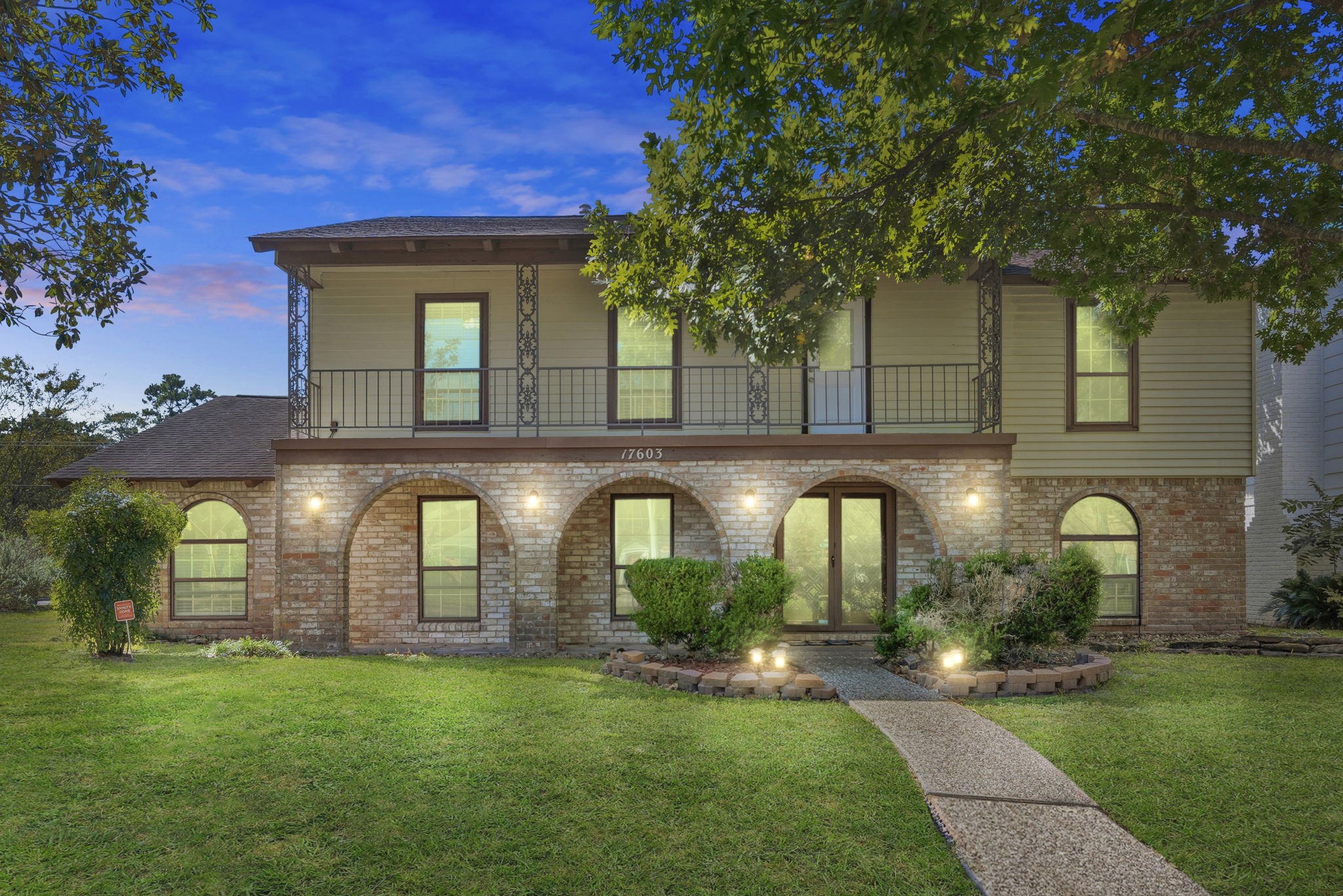 17603 Loring Lane Spring, TX 77388 - Photo 2 of 50 front view of a house with a garden