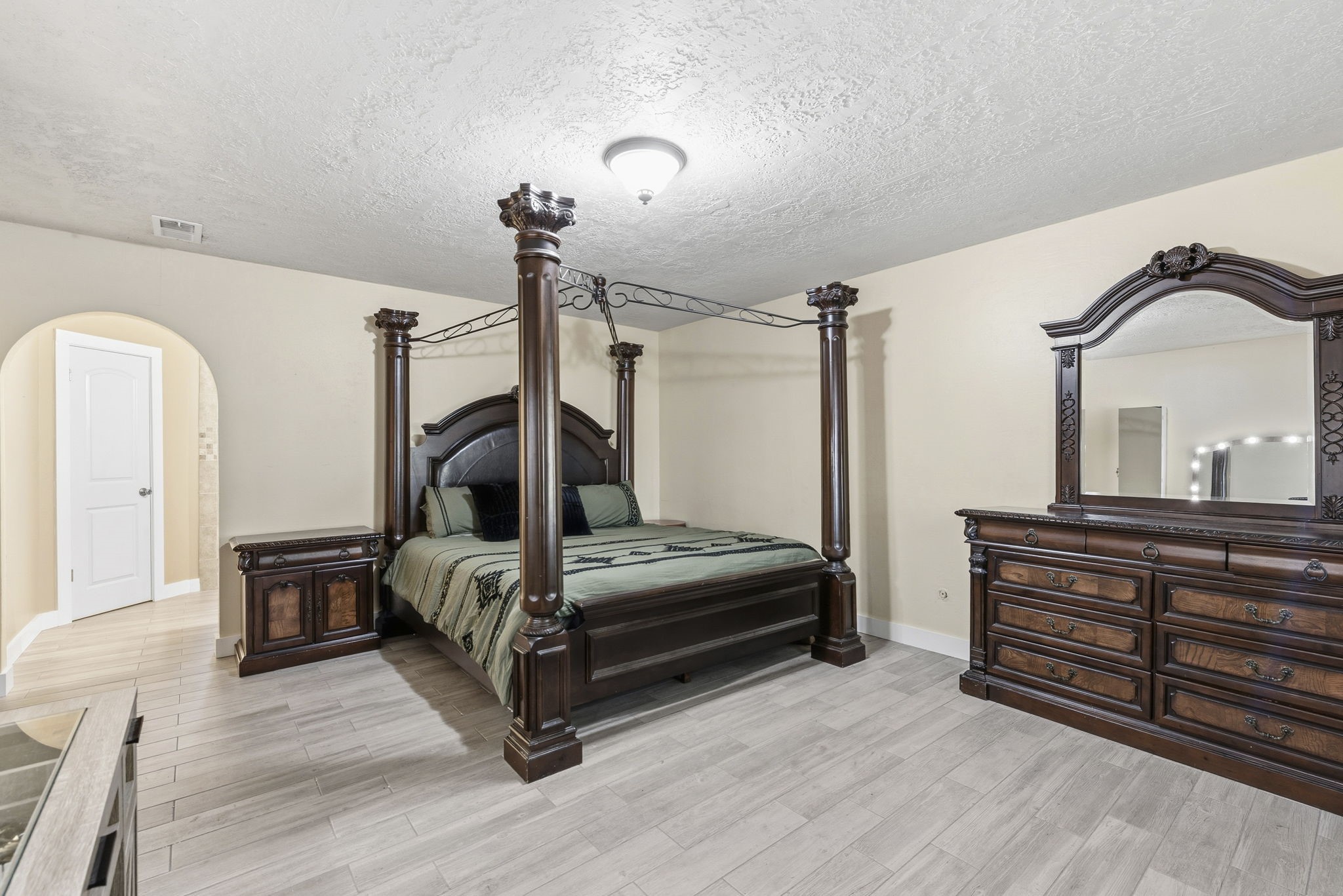 17603 Loring Lane Spring, TX 77388 - Photo 24 of 50 a bedroom with furniture and wooden floor