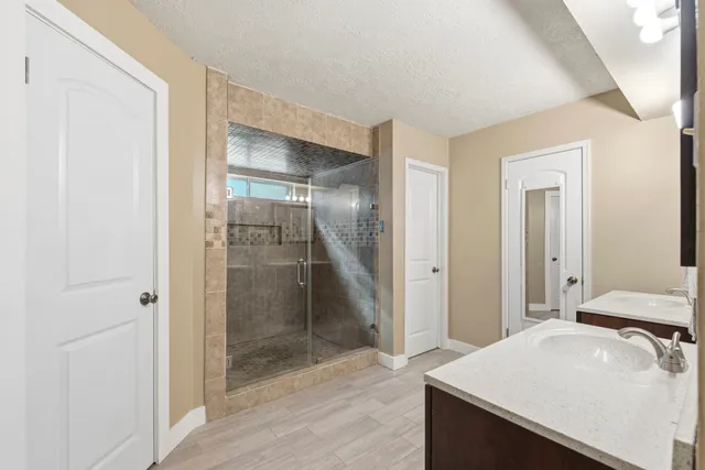 a bathroom with a sink and a mirror