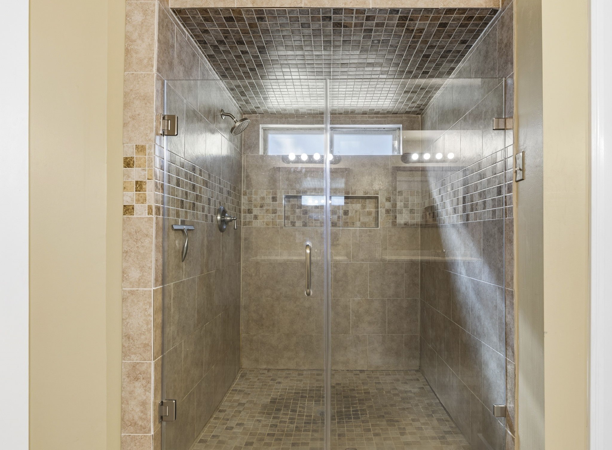 17603 Loring Lane Spring, TX 77388 - Photo 28 of 50 a bathroom with a glass shower door