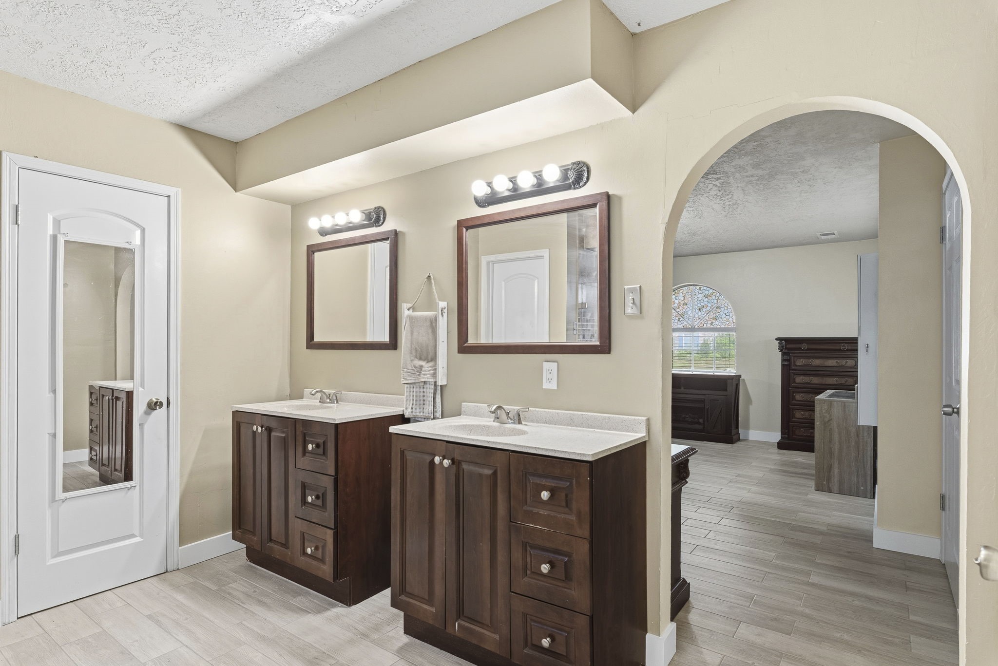 17603 Loring Lane Spring, TX 77388 - Photo 29 of 50 a spacious bathroom with a double vanity sink and a mirror
