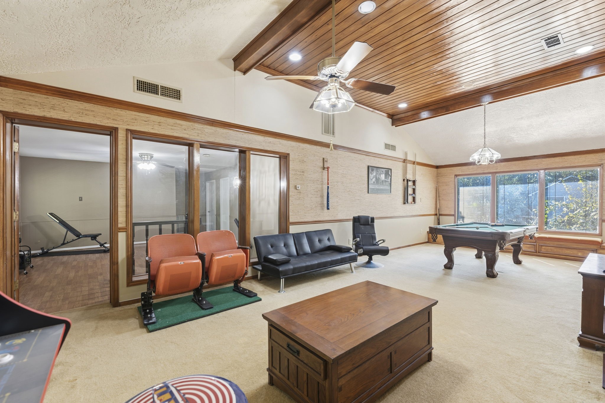 17603 Loring Lane Spring, TX 77388 - Photo 35 of 50 a living room with furniture a ceiling fan and a large window