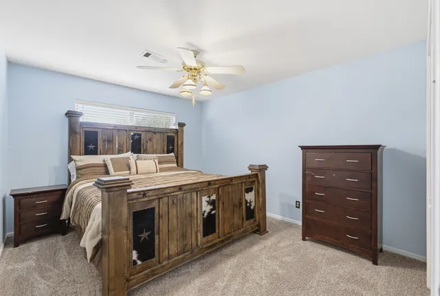 a view of a bedroom with washing machine