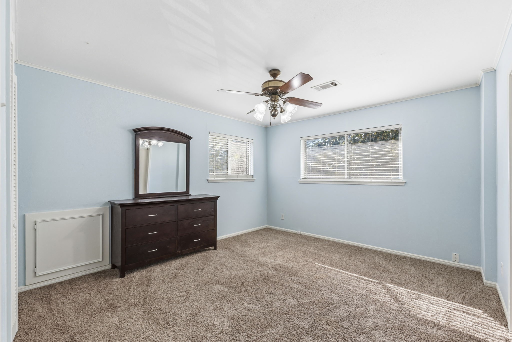 17603 Loring Lane Spring, TX 77388 - Photo 39 of 50 a room with a window and a dresser
