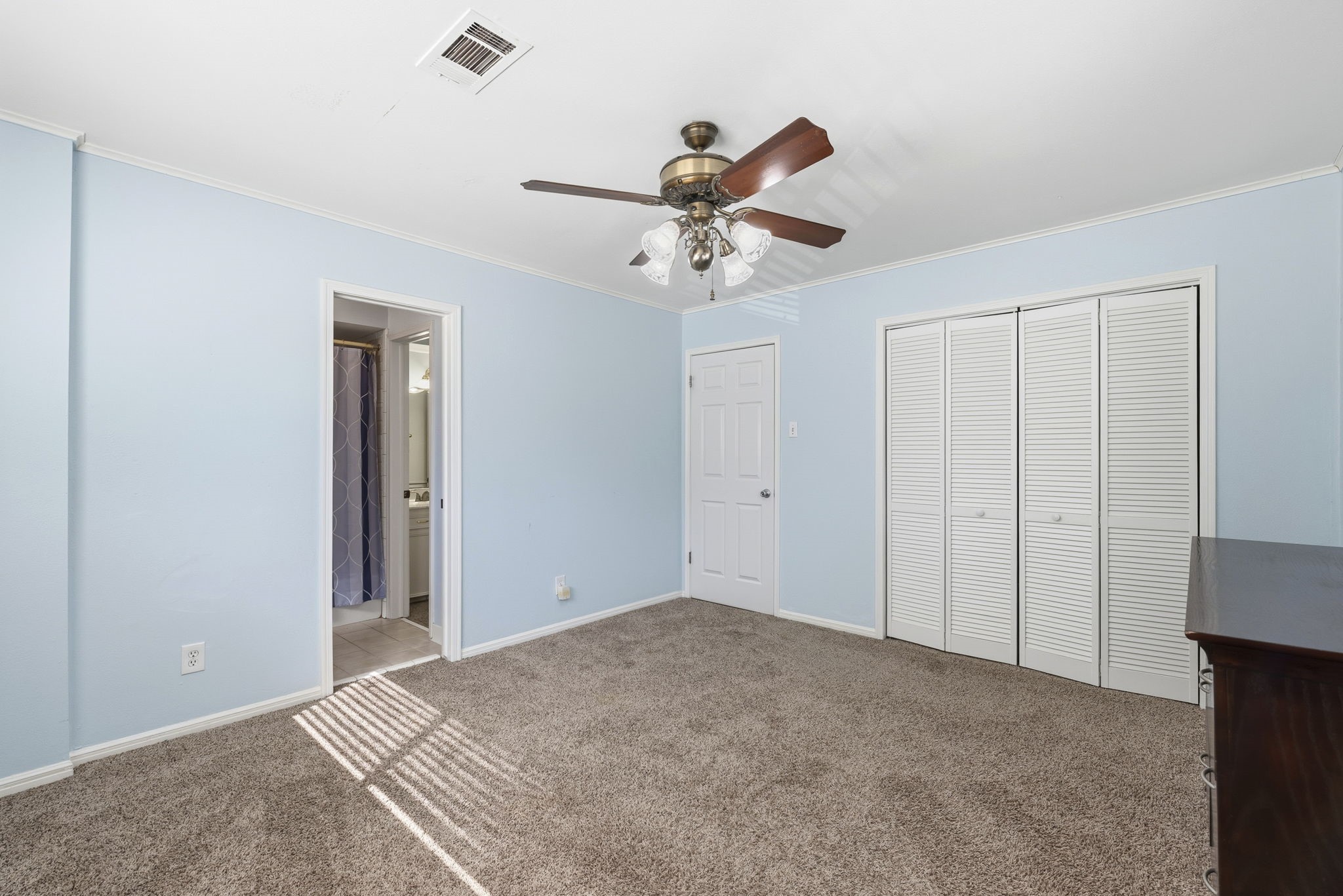 17603 Loring Lane Spring, TX 77388 - Photo 40 of 50 a view of a room with a ceiling fan and a window