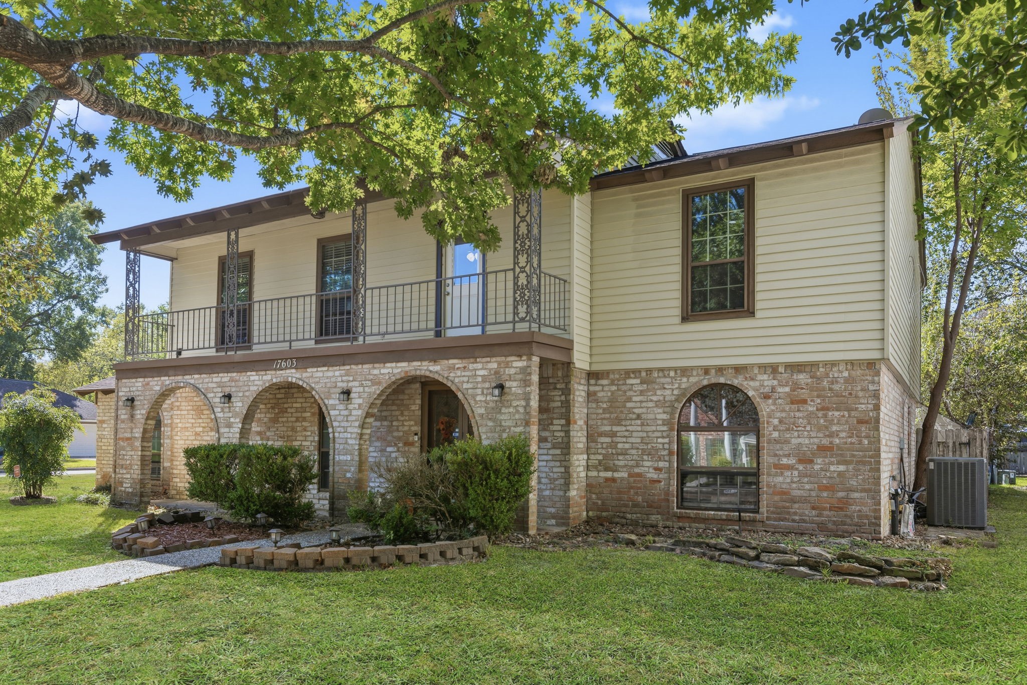 17603 Loring Lane Spring, TX 77388 - Photo 4 of 50 front view of a house with a garden