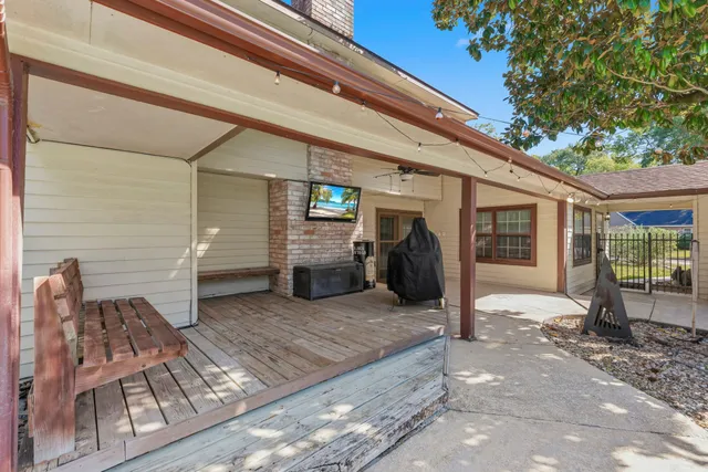 a view of a porch with seating space