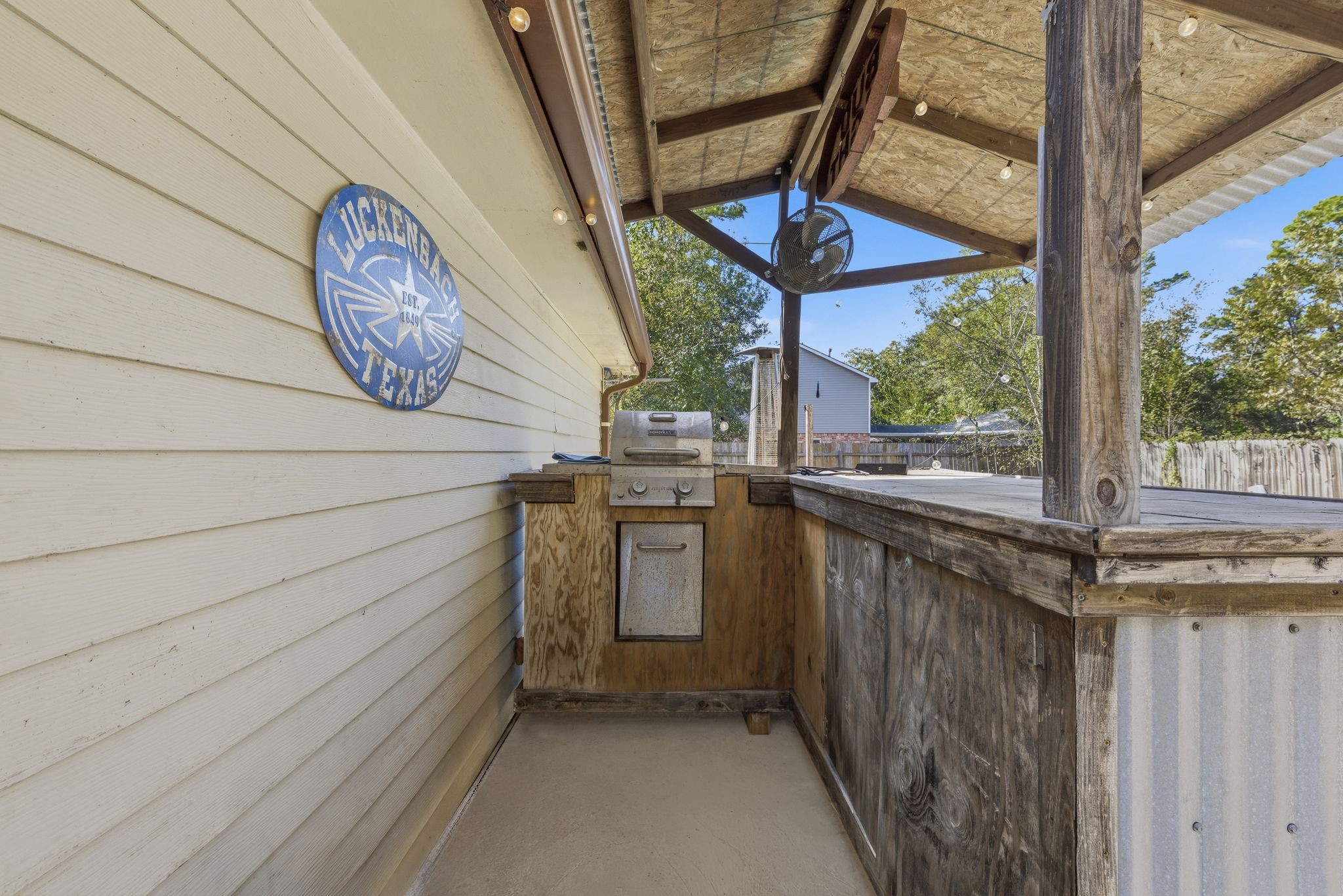 17603 Loring Lane Spring, TX 77388 - Photo 45 of 50 a kitchen with a stove a sink and a wooden floor